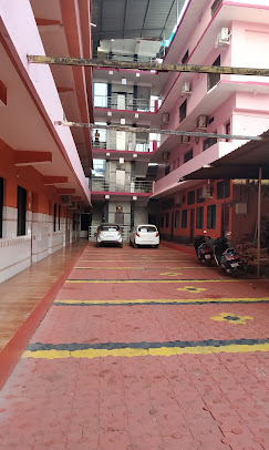 Property courtyard and parking area at Yamuna Vihar Tourist Home