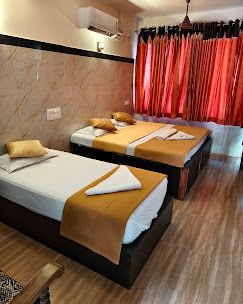 Family suite beds at Yamuna Vihar Tourist Home